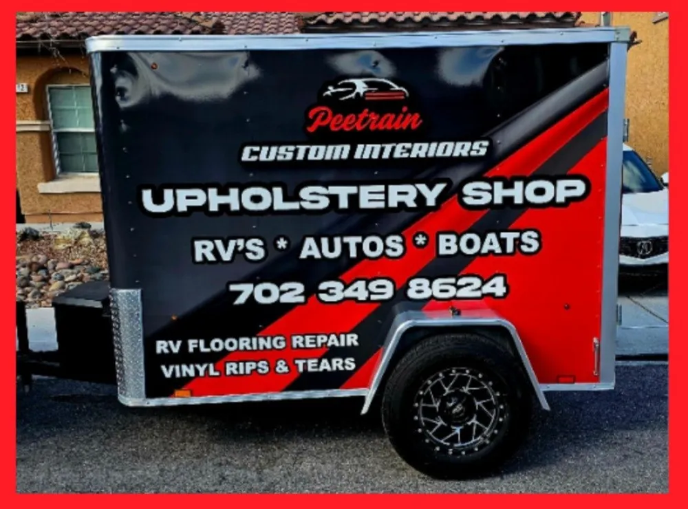 Trailer with a sign that reads 