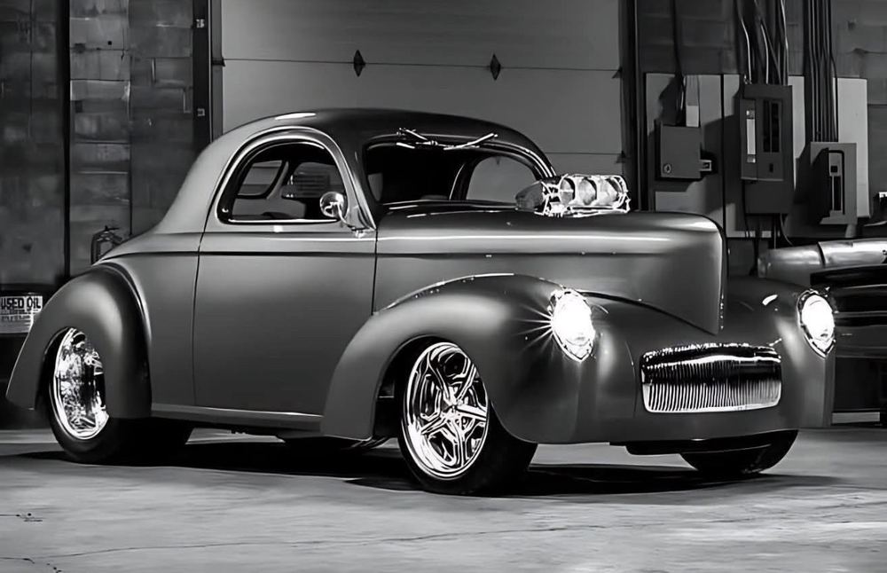 Sleek classic coupe in industrial garage